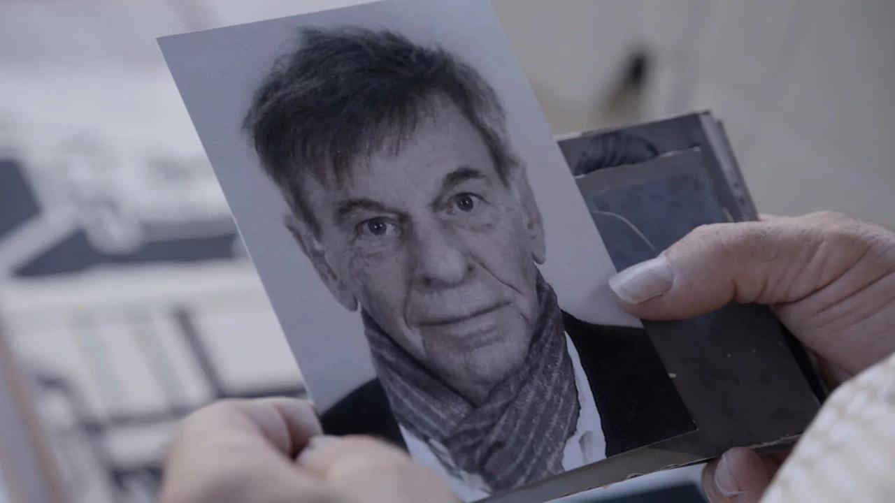 The A’dammer - The Man Behind the Cabinet backdrop