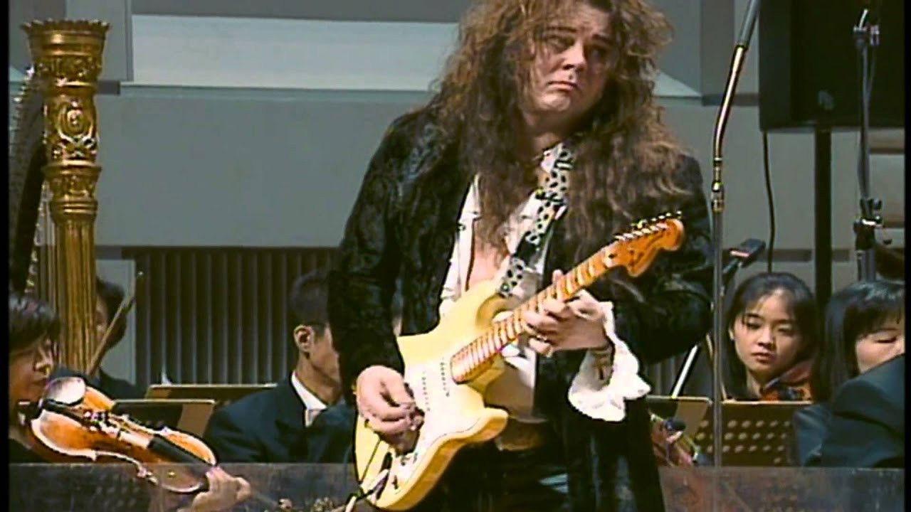 Yngwie Malmsteen: Concerto Suite for Electric Guitar and Orchestra in E Flat Minor Op. 1 backdrop