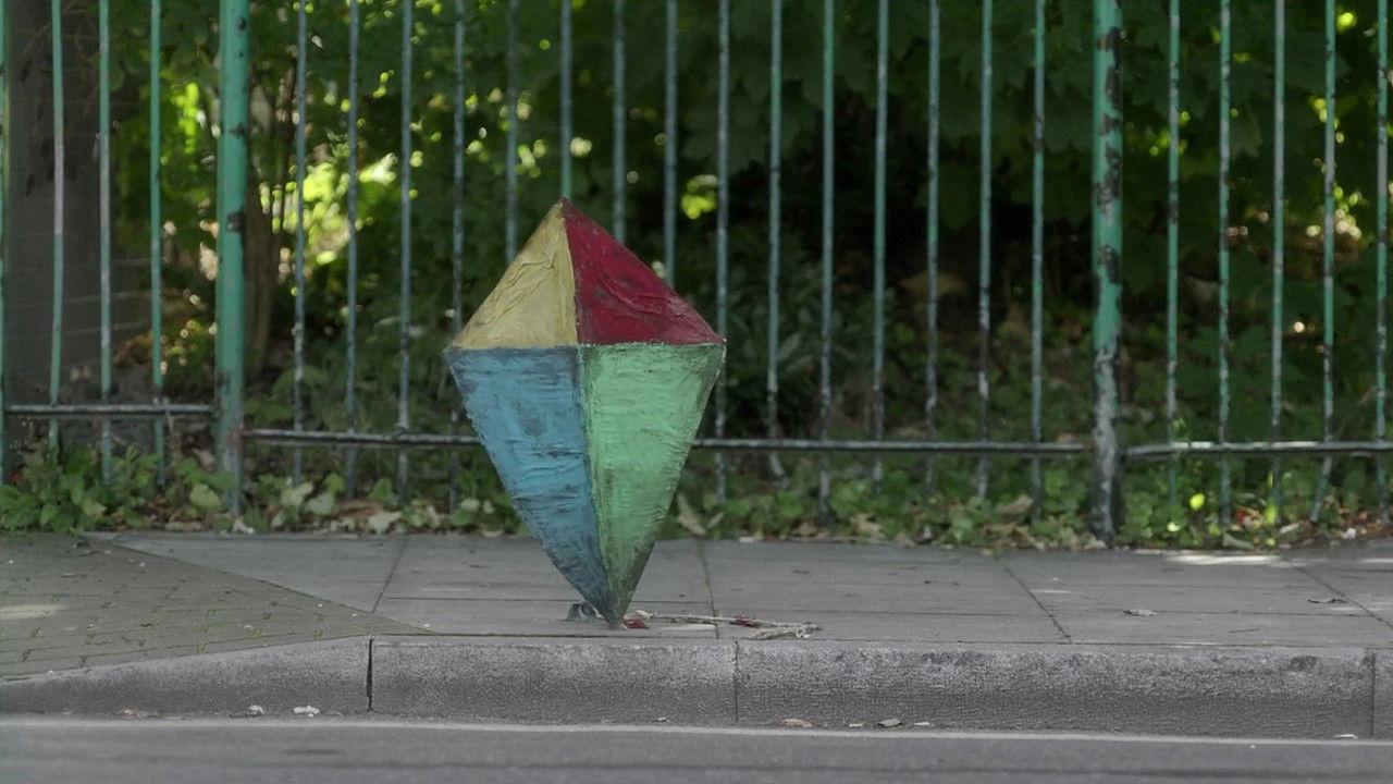 How a Kite Flies backdrop