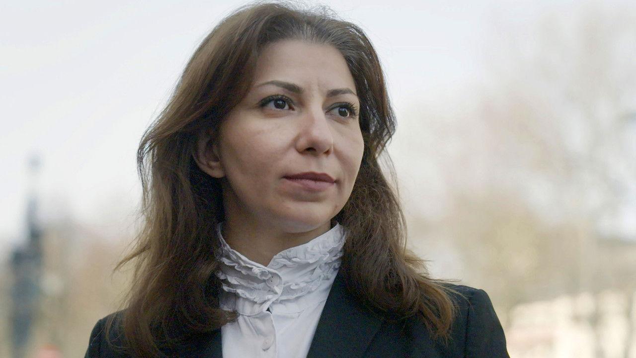 The Journalist and Her Jailers backdrop