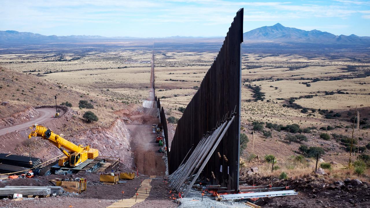Under the Shadow of the Wall backdrop