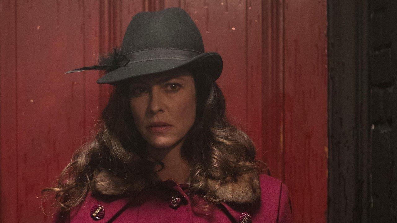 The Most Assassinated Woman in the World backdrop