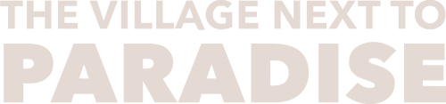 The Village Next to Paradise logo